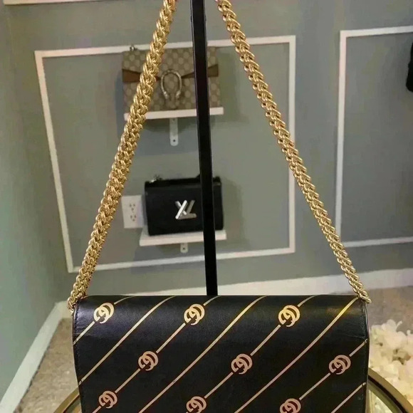 Gucci mini leather chain bag with double G stripe in black and gold. - Picture 11 of 14